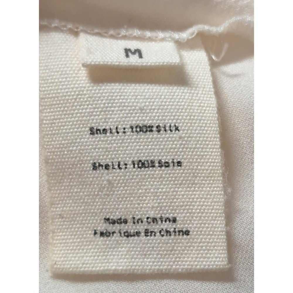 L'AGENCE Off White Ruffle Front Sleeveless Blouse Button Keyhole Back Top - Picture 9 of 9